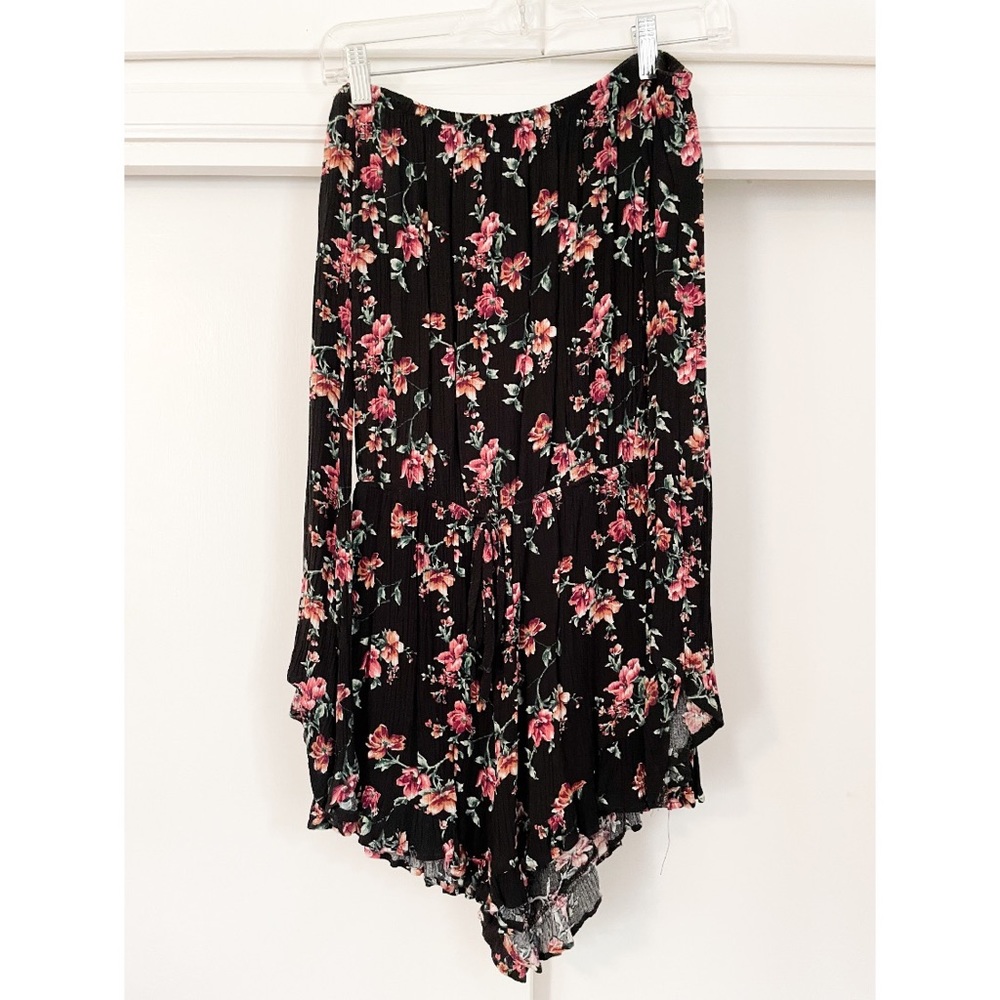 Long sleeved romper with flowy off-shoulder sleeves and cinched waist